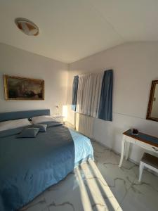 Ένα ή περισσότερα κρεβάτια σε δωμάτιο στο Villa Mira