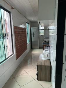 a kitchen with a sink and a counter in a room at Apartamento - Ed Sacy - COP 30 in Belém +17 photos