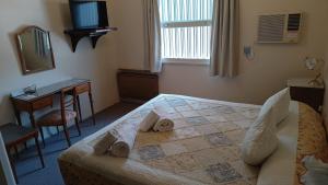Cama ou camas em um quarto em Grand Hotel Balbi