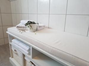 Postel nebo postele na pokoji v ubytování Gästehaus Arkona