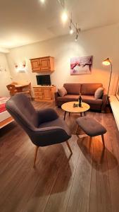 Posezení v ubytování Gemütliches Alpenstudio mitten in Davos perfekt angebunden, extrem ruhig und ideal als Rückzugsort für Entspannung, sportliche Aktivitäten oder ein entspanntes Wochenende