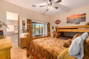 a bedroom with a bed and a ceiling fan at Desert Foothils Private Resort Oasis in Scottsdale +34 photos