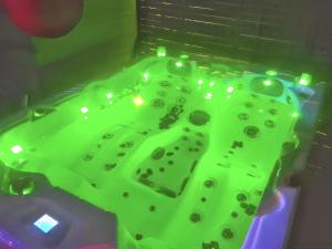 a close up of a green table with lights on it at Appartement charmant à Sainte-Rose de 40 m² avec piscine in Sainte-Rose