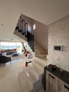 Photo de la galerie de l'établissement Duplex de rêve vue mer et golf !, à Taghazout 26 autres photos