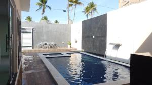 Swimmingpoolen hos eller tæt på Casa Maragogi