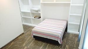 En eller flere senge i et værelse på Casa Maragogi + 21 billeder