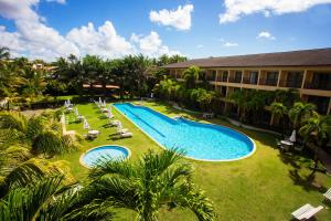 an aerial view of a resort with a swimming pool at Catussaba Business Hotel in Salvador