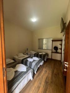 Cama ou camas em um quarto em Pousada Portal da Lua