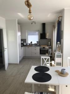 Fotografie z fotogalerie ubytování Strandhaus-Appartment-Rauchschwalbe v destinaci Fehmarnsund