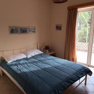 Postel nebo postele na pokoji v ubytování Seaside villa in Eretria