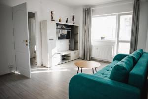 Et opholdsområde på CozyApartment near MetroGorjului