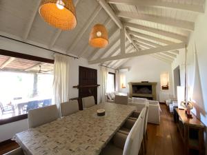 a dining room with a table and chairs at CHACRA con VISTA AL CAMPO DE POLO in Pilar