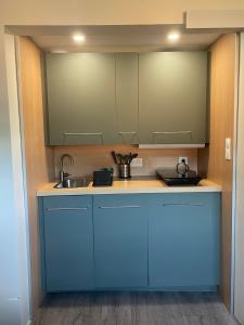 Kuchyň nebo kuchyňský kout v ubytování L'Impasse en Duo, appartement cosy 2 personnes avec SPA extérieur privé