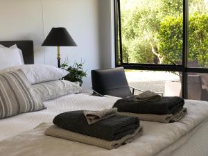 Postel nebo postele na pokoji v ubytování Villetta - Matakana Country Escape