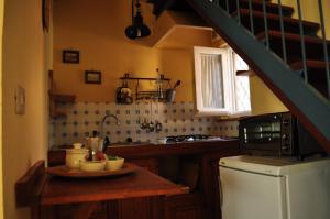 A kitchen or kitchenette at Podere L'Olmaia