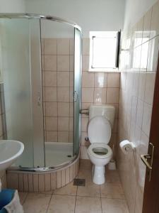 Koupelna v ubytování Apartment Slaven
