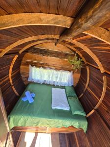 Ecodreamers Curiti客房内的一张或多张床位