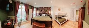 a bedroom with a small bed in a room at Burton Stone Inn in York