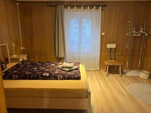 Voodi või voodid majutusasutuse Haus Albula 2 toas