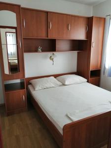 Postel nebo postele na pokoji v ubytování Apartment Slaven