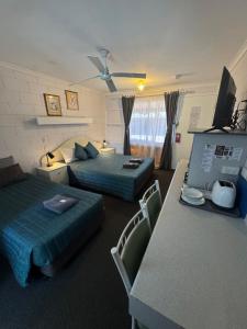 Postel nebo postele na pokoji v ubytování Warrego Motel