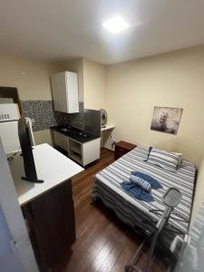 Η κουζίνα ή μικρή κουζίνα στο Pousada e Lofts Jardim Ap09