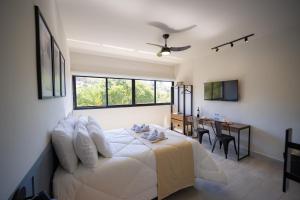 Μια τηλεόραση ή/και κέντρο ψυχαγωγίας στο Loft Moderno com Vista para as Montanhas