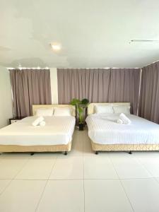Postel nebo postele na pokoji v ubytování Seahome Boutique Hotel