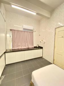 Postel nebo postele na pokoji v ubytování Seahome Boutique Hotel