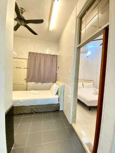 Postel nebo postele na pokoji v ubytování Seahome Boutique Hotel