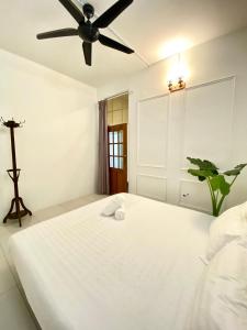 Postel nebo postele na pokoji v ubytování Seahome Boutique Hotel