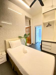 Postel nebo postele na pokoji v ubytování Seahome Boutique Hotel
