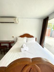 Postel nebo postele na pokoji v ubytování Seahome Boutique Hotel