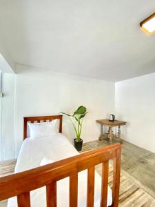Postel nebo postele na pokoji v ubytování Seahome Boutique Hotel