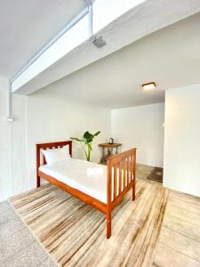 Postel nebo postele na pokoji v ubytování Seahome Boutique Hotel