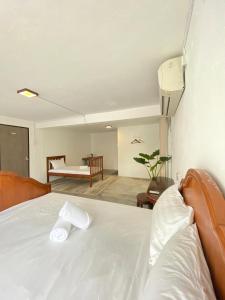 Postel nebo postele na pokoji v ubytování Seahome Boutique Hotel + 37 fotografií