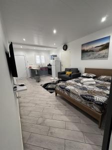 A bed or beds in a room at La Villa Navidad