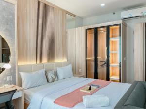 Fotografie z fotogalerie ubytování Big and Comfy Studio at Vasanta Innopark Apartment By Travelio v destinaci Cikarang