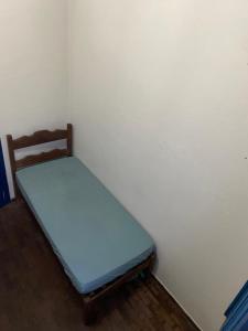 Ένα ή περισσότερα κρεβάτια σε δωμάτιο στο Republica Cruz Vermelha