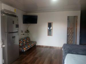 TV a/nebo společenská místnost v ubytování La casita de Issa via Boquete