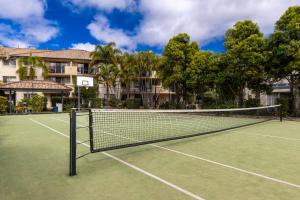 a tennis net on a tennis court in front of a building at Turtle Beach Resort - Accor Vacation Club Apartments in Gold Coast