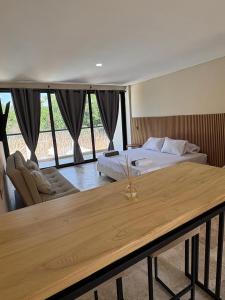 Postel nebo postele na pokoji v ubytování Forest Condominio