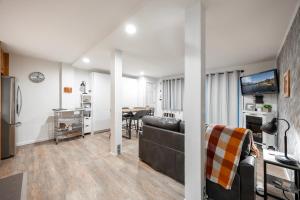 a living room with a couch and a table at Stunning Deluxe King Studio #124 at Donner Lake Village in Truckee