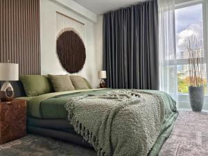 a bedroom with a bed and a large window at MIAMI WOOD APART HOTEL NEW 2025 - PRIVATE TERRACE - Parking - Beach 5 min in Hollywood +60 photos