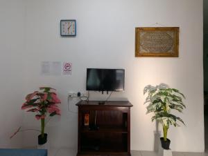 TV a/nebo společenská místnost v ubytování HOMESTAY IBUNDA Sabak Bernam