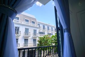 a view of a building from a window at 6668 Hotel - Chi nhánh 1 in Tây Ninh