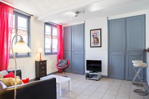 Khu vực ghế ngồi tại Appartement du Port de Honfleur