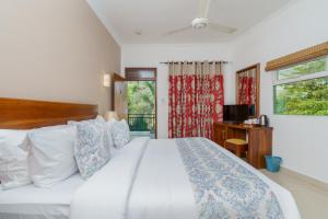 Letto o letti in una camera di Hotel Travellers Nest Kandy