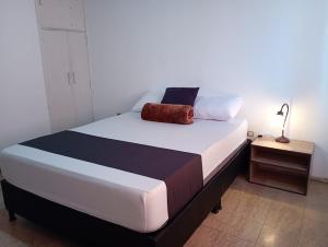 Hotel Alpino Armenia客房内的一张或多张床位