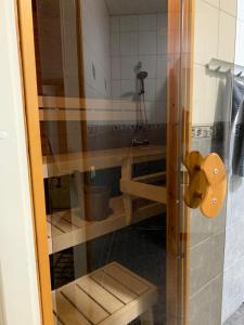 a bathroom with a sink and a toilet in a room at Cozy 2BR Apartment KA64 with sauna in Oulu +17 photos